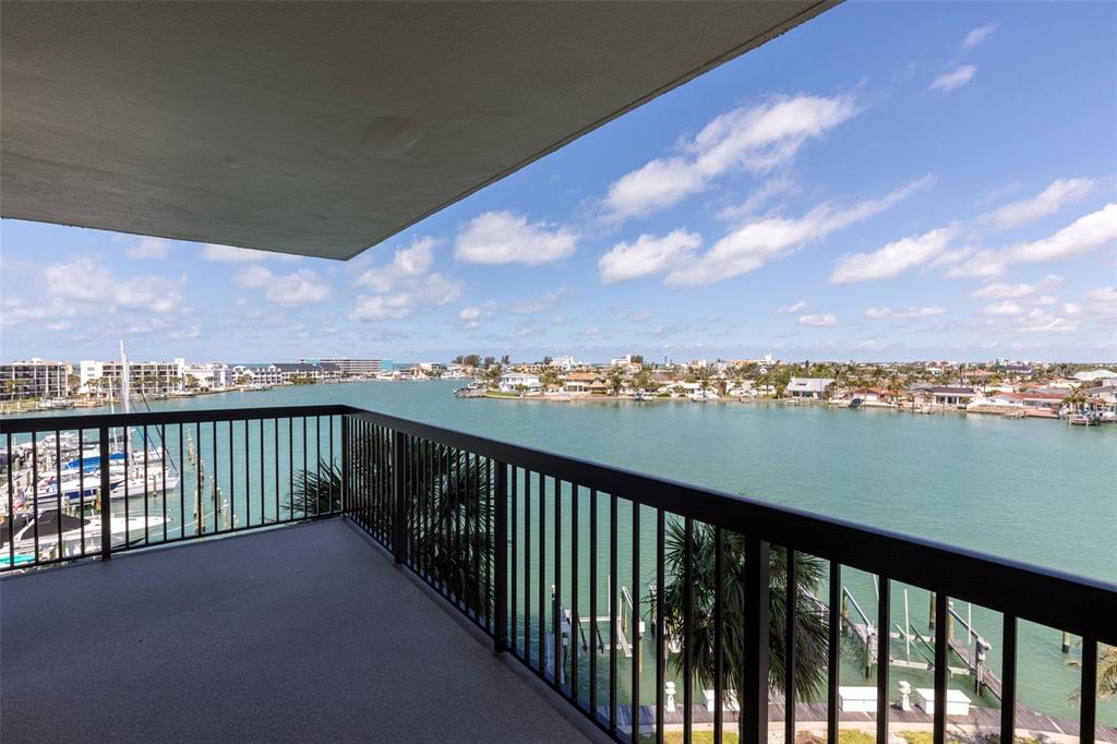 9525 Blind Pass Road, Unit 508 St. Pete Beach, FL 33706 - Photo 5 of 24 a view of city from a balcony