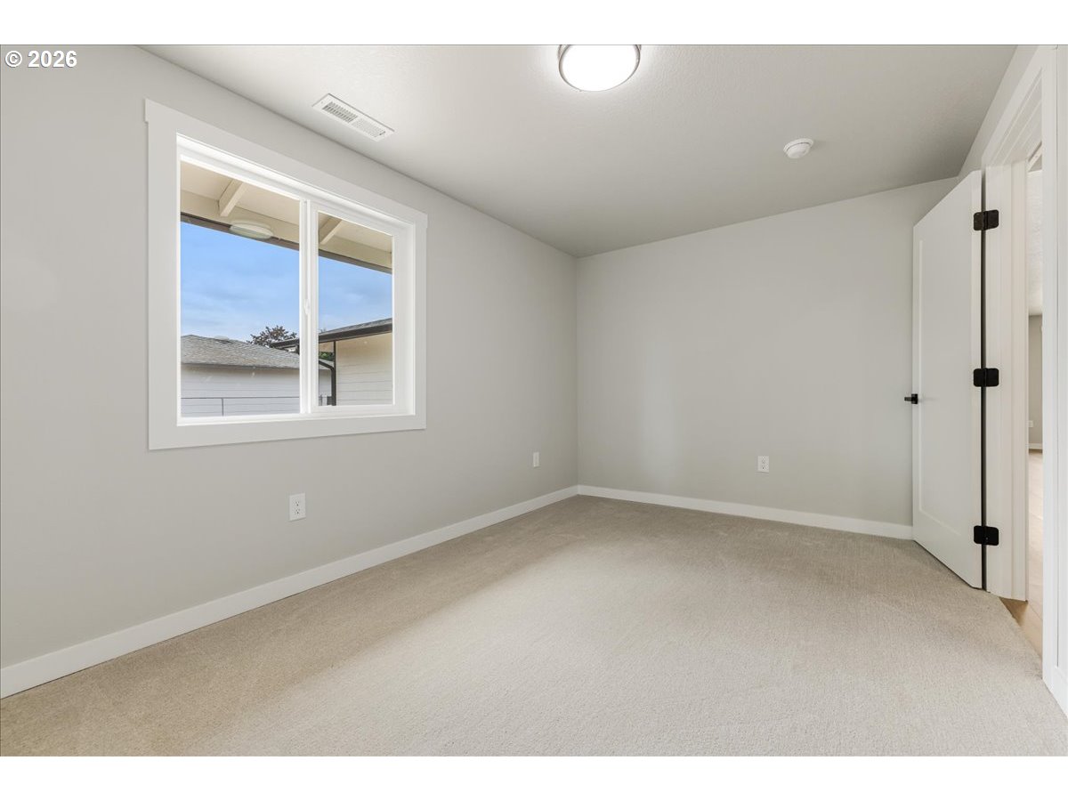 795 Northwest 6th Avenue Canby, OR 97013 - Photo 22 of 40 a view of empty room with windows