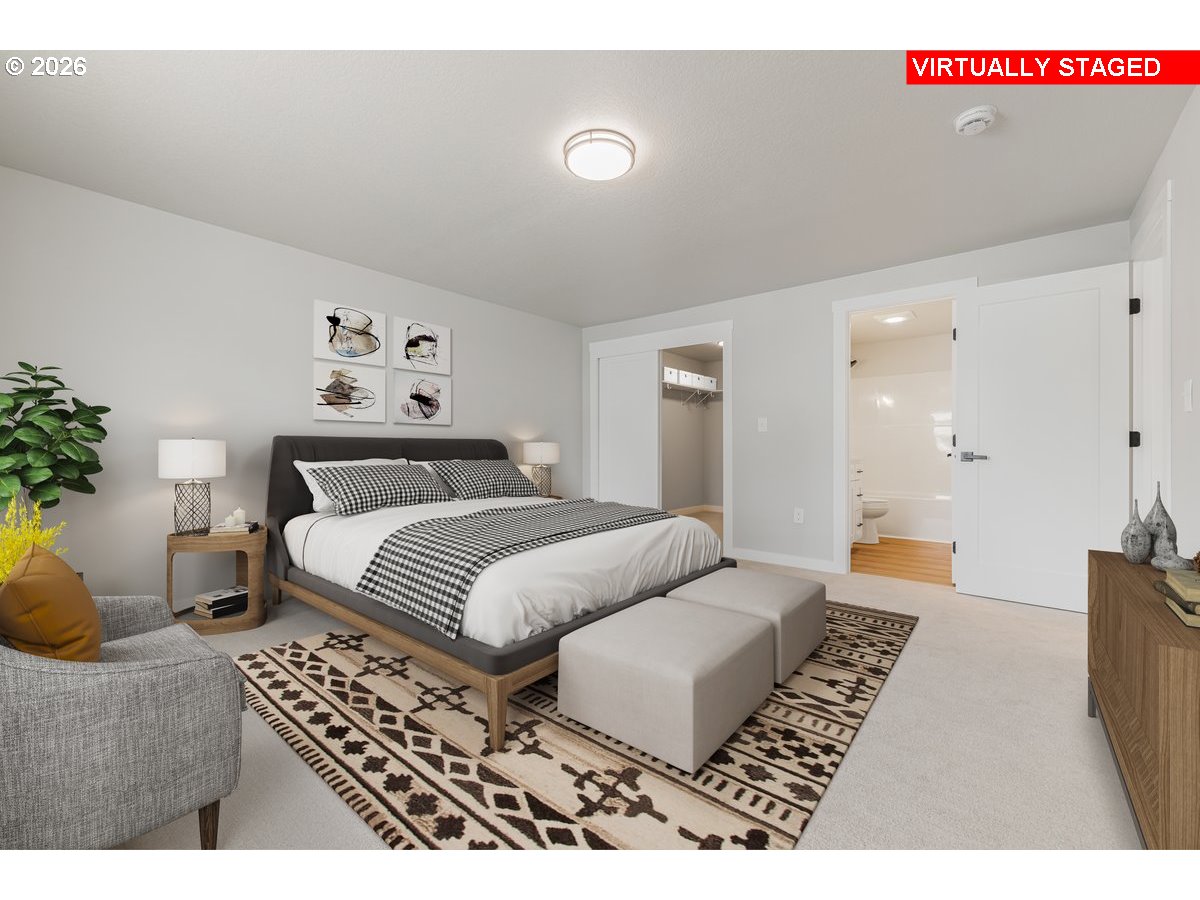 795 Northwest 6th Avenue Canby, OR 97013 - Photo 27 of 40 a bedroom with a bed and a couch