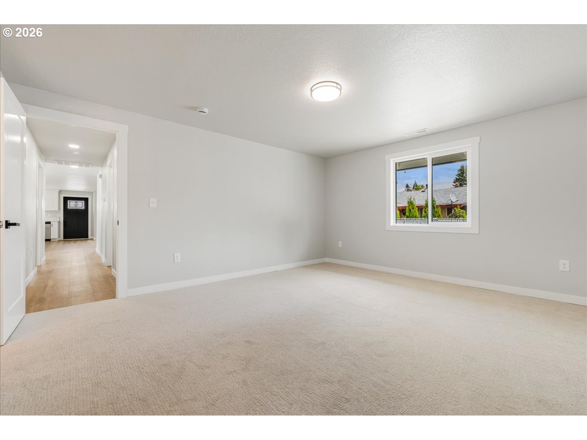 795 Northwest 6th Avenue Canby, OR 97013 - Photo 31 of 40 a view of an empty room with a window