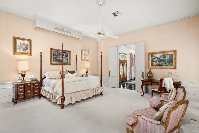 a bedroom with a bed and furniture