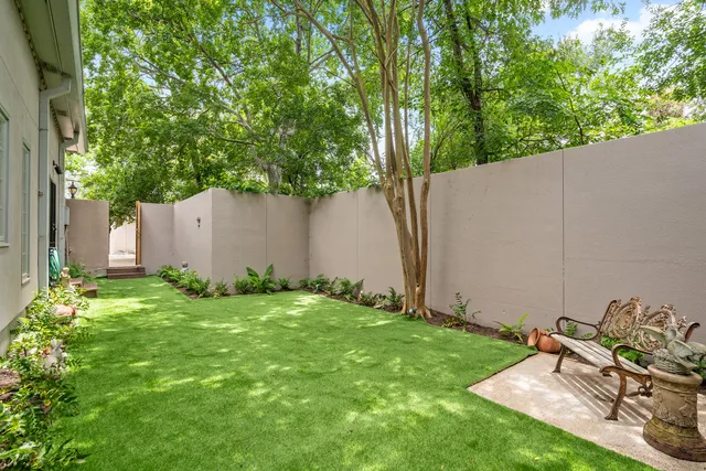 a backyard of a house with seating space