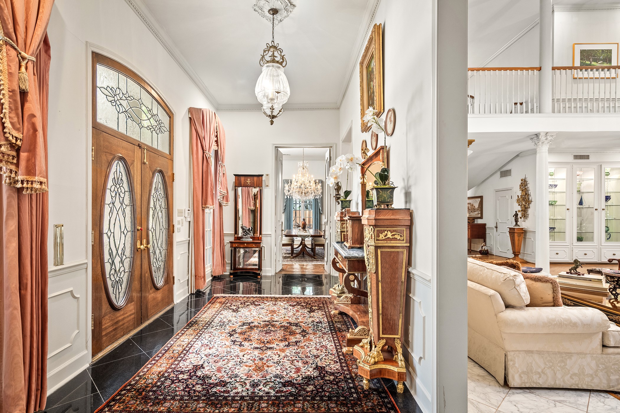903 Rocky River Road Houston, TX 77056 - Photo 4 of 45 a view of living room filled with furniture and large windows