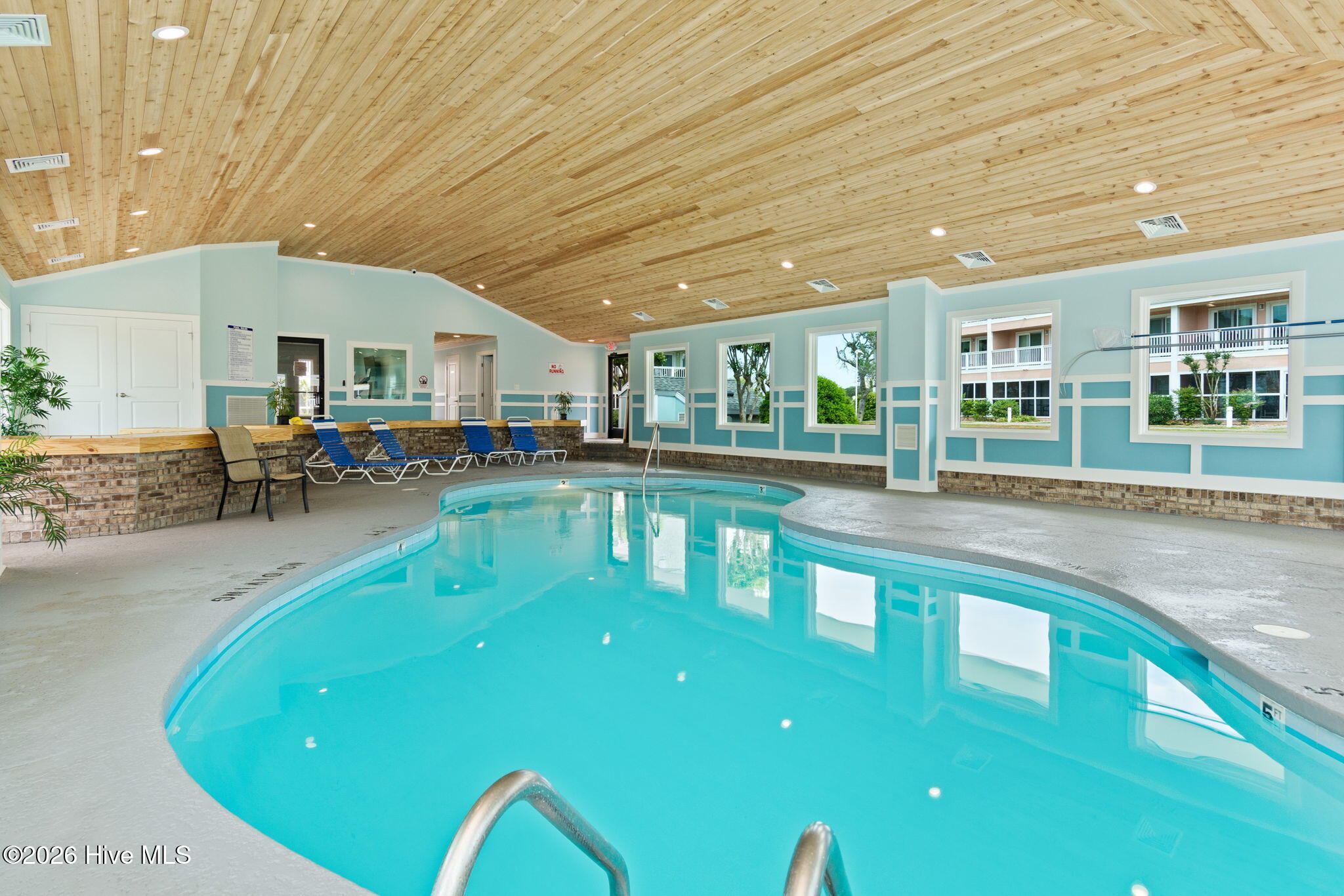 9201 Coast Guard Road, Unit F202 Emerald Isle, NC 28594 - Photo 30 of 44 28-web-or-mls-PB-InsidePool-2