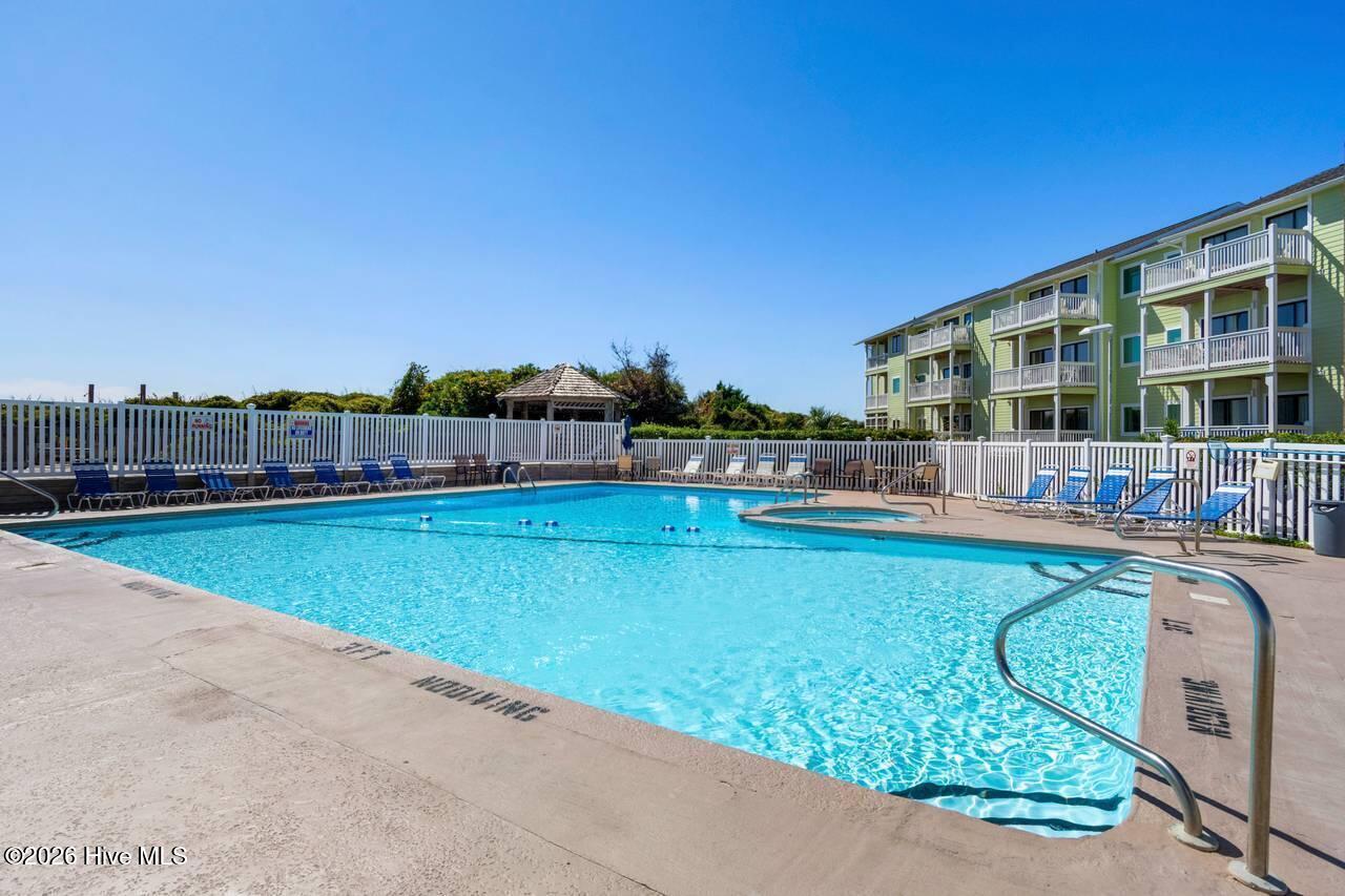 9201 Coast Guard Road, Unit F202 Emerald Isle, NC 28594 - Photo 42 of 44 41-web-or-mls-Pool-close-2