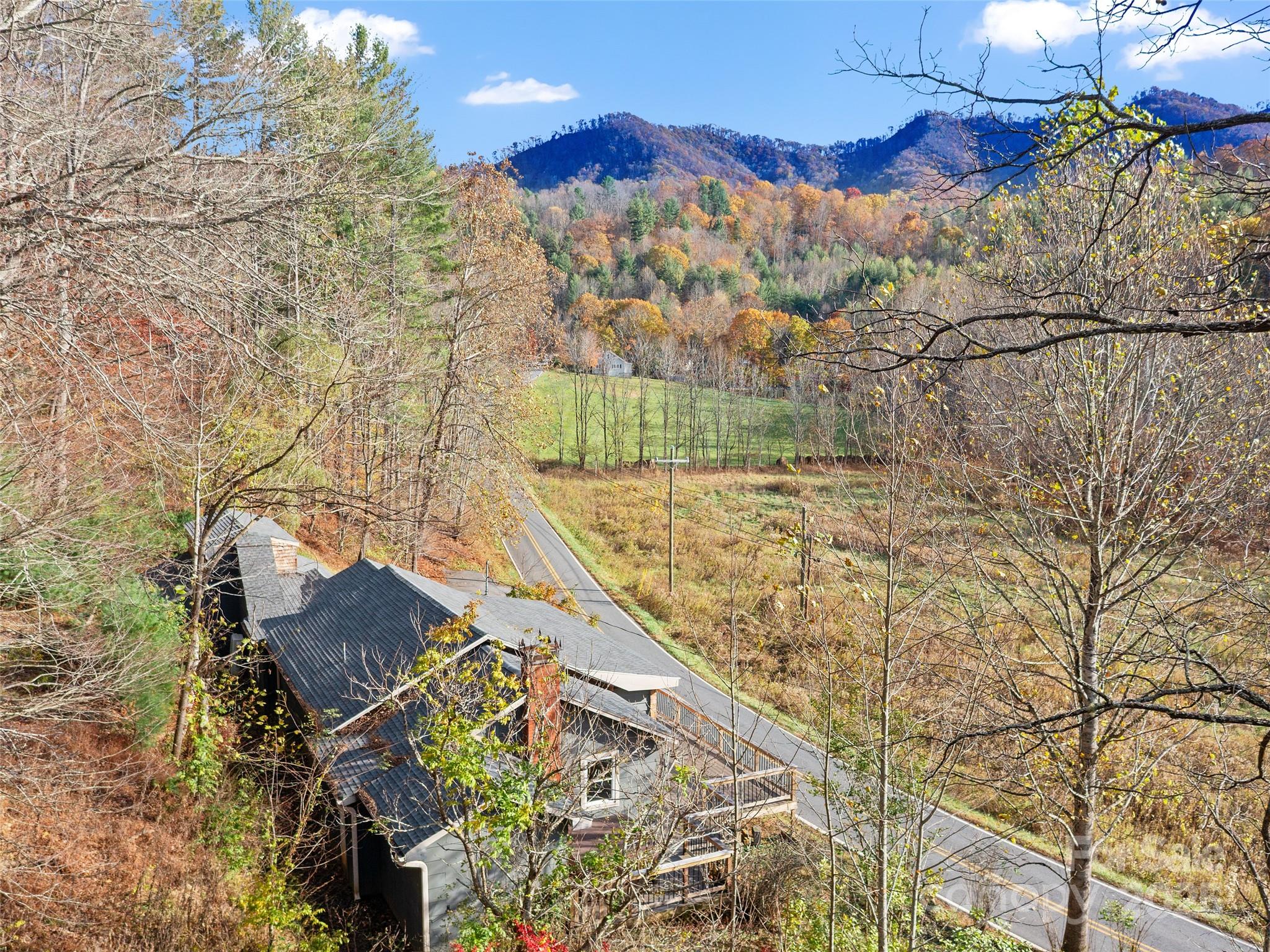 3477 Cane Creek Road Bakersville, NC 28705 - Photo 27 of 30 a view of an outdoor space and a yard