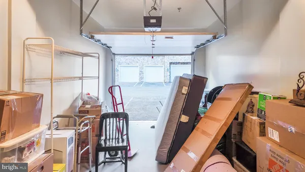 a view of a swimming pool with chairs in patio
