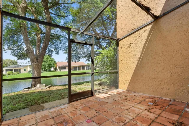 a view of a porch with a yard