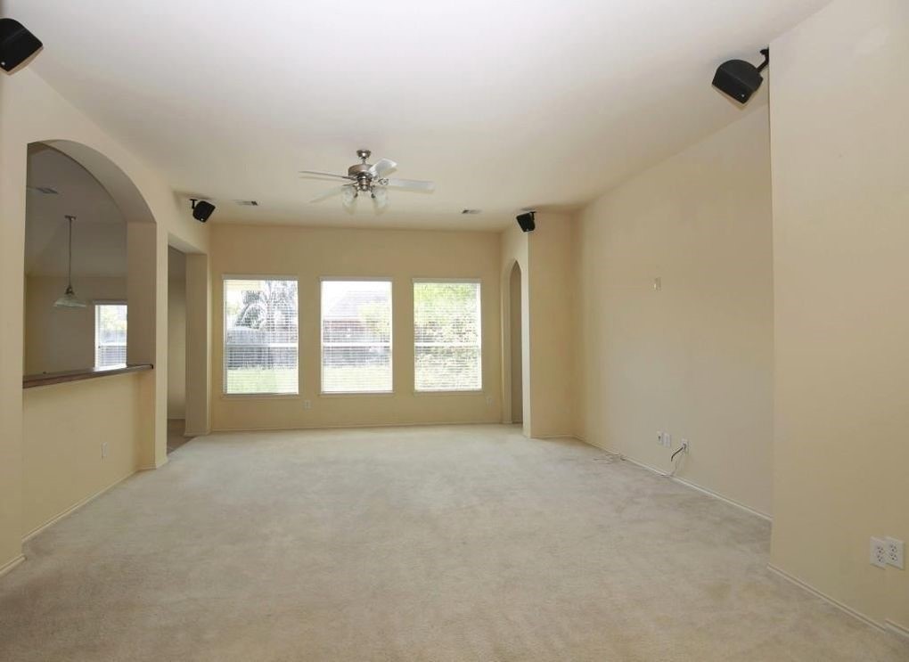 17223 Valhallah Way Houston, TX 77095 - Photo 3 of 14 a view of an empty room with a window