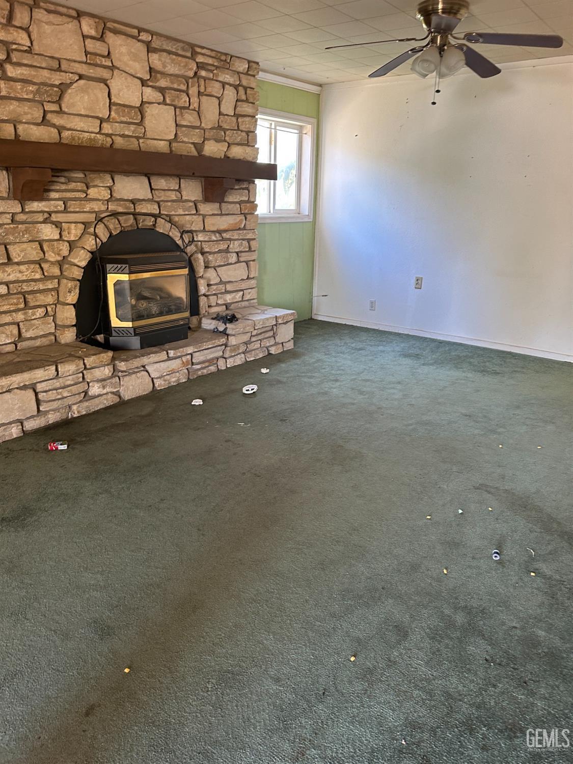 Undisclosed Address Bakersfield, CA 93305 - Photo 6 of 19 a view of a fireplace and window