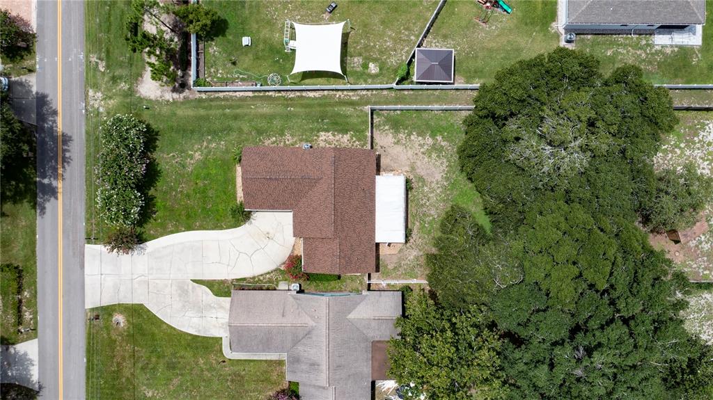 11746 Oswalt Road Clermont, FL 34711 - Photo 34 of 35 an aerial view of a house with outdoor space