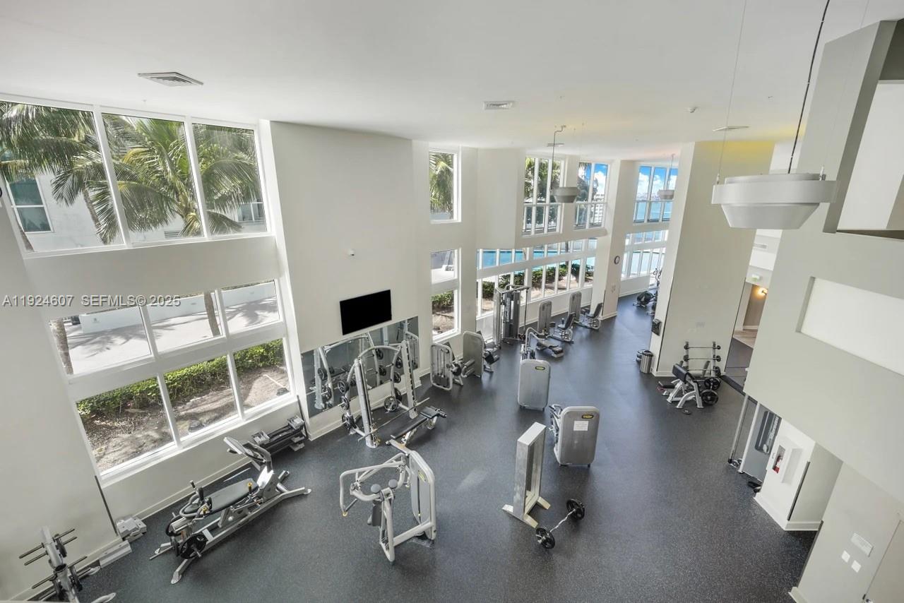 1900 North Bayshore Drive, Unit 2615 Miami, FL 33132 - Photo 16 of 17 a view of a room with gym equipment