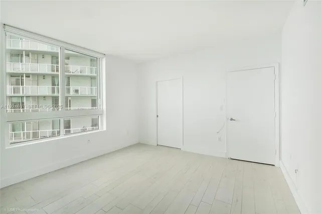 an empty room with a window