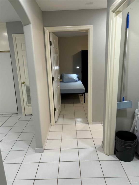 144 Redwood Road, Unit 2 Rio Grande City, TX 78582 - Photo 2 of 10 a bathroom with a sink and a mirror