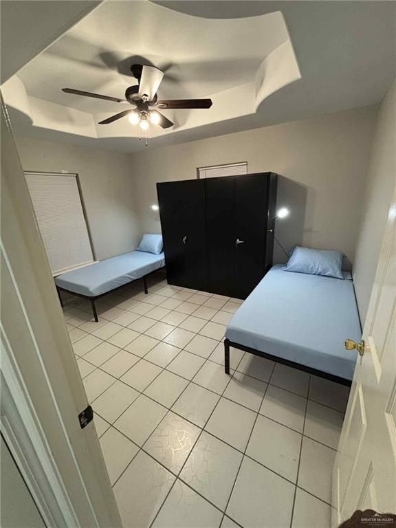 144 Redwood Road, Unit 2 Rio Grande City, TX 78582 - Photo 8 of 10 a living room with a couch