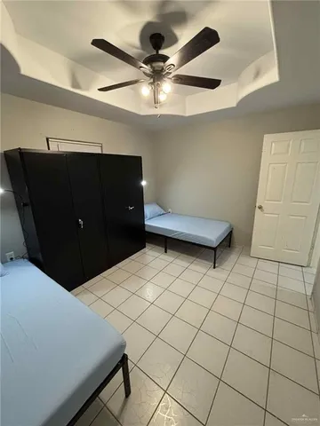 a living room with a black white checkered table