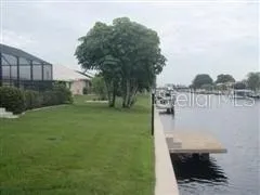 a view of a lake with a yard