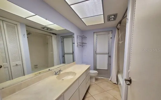 a bathroom with a bathtub and a sink
