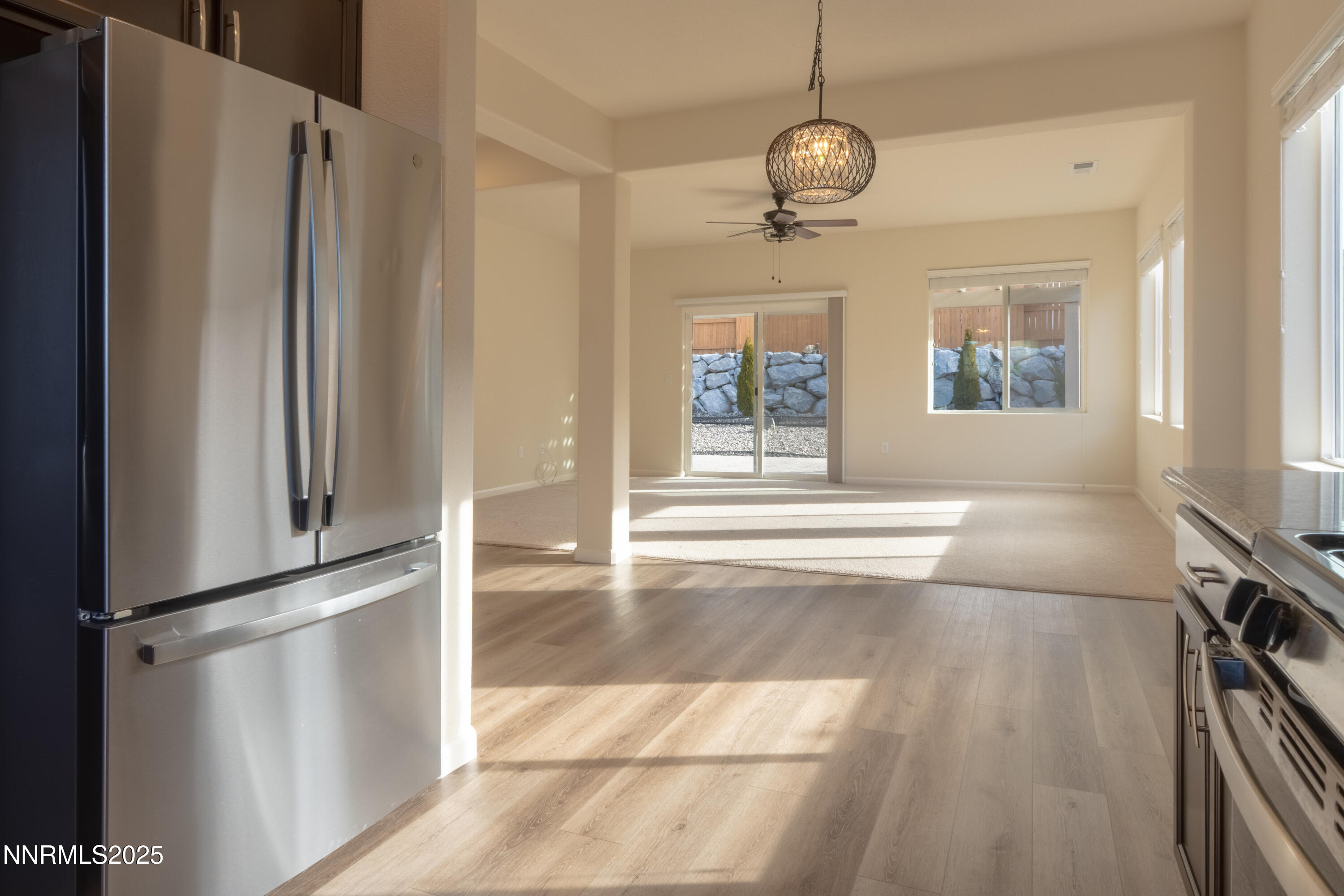 14524 Leiden Drive Reno, NV 89506 - Photo 12 of 33 a view of a living room with windows and ceiling fan