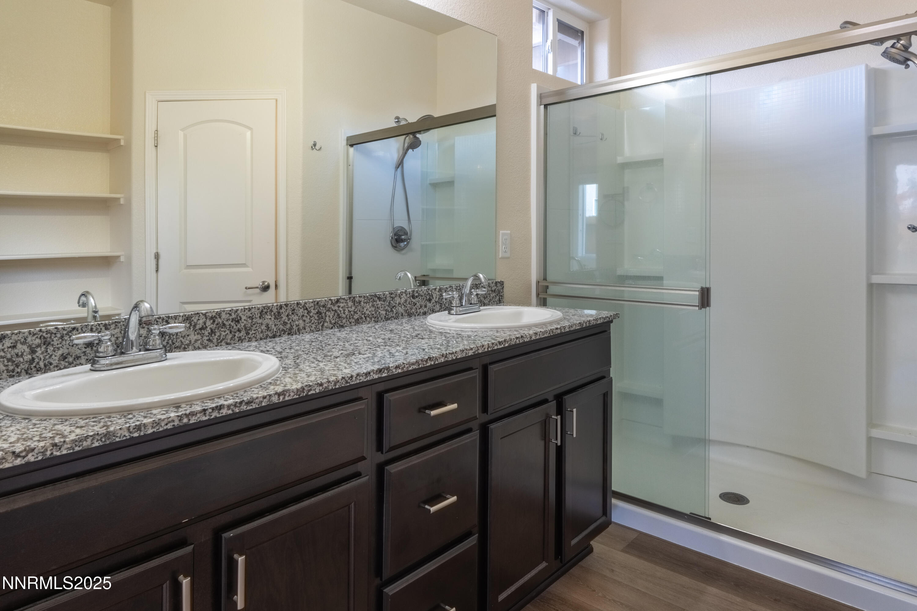 14524 Leiden Drive Reno, NV 89506 - Photo 16 of 33 a bathroom with a granite countertop sink mirror and double