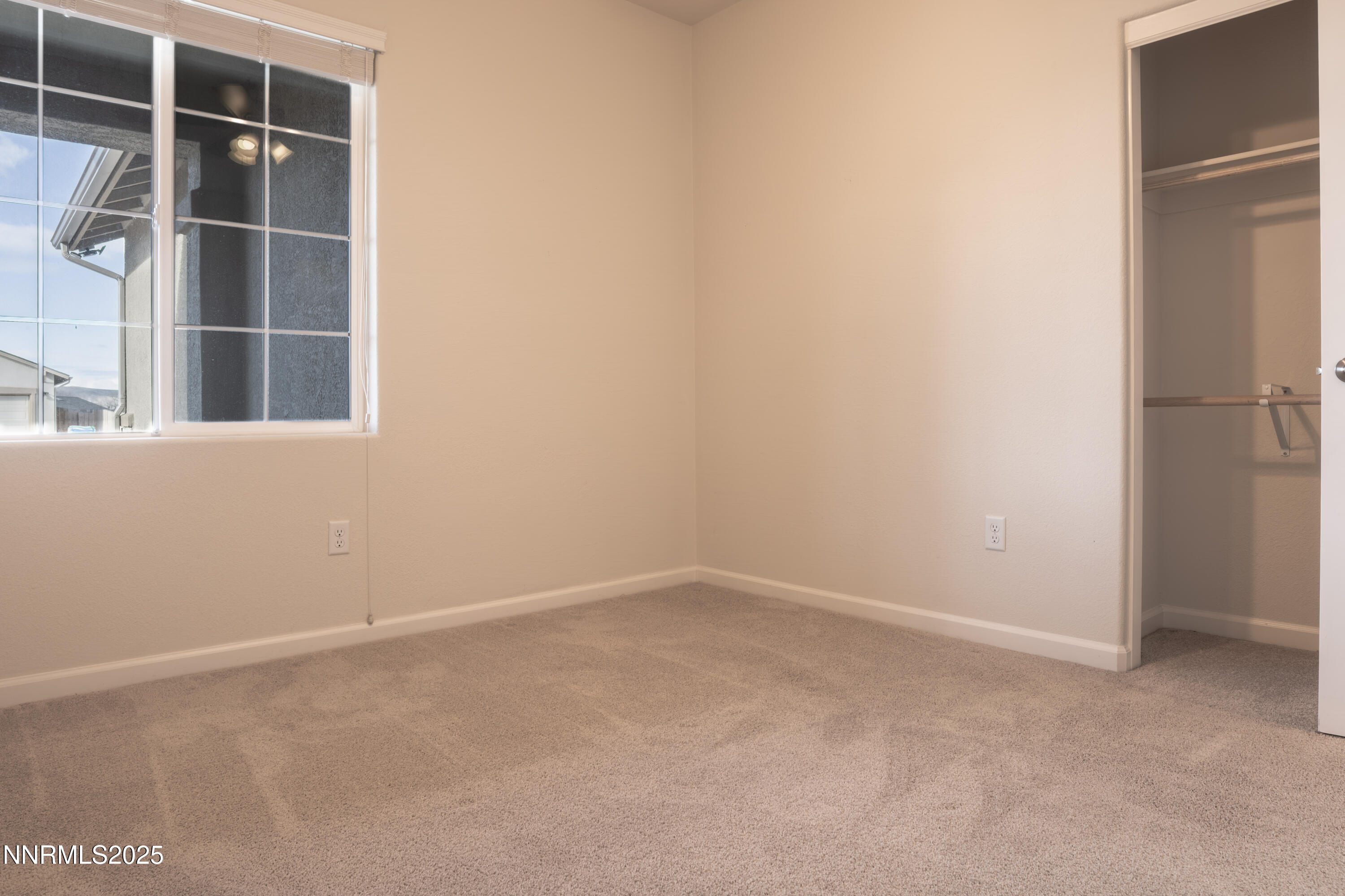 14524 Leiden Drive Reno, NV 89506 - Photo 23 of 33 a view of an empty room with a window