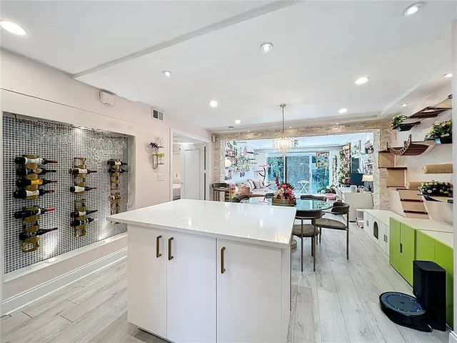 a view of a kitchen and dining room
