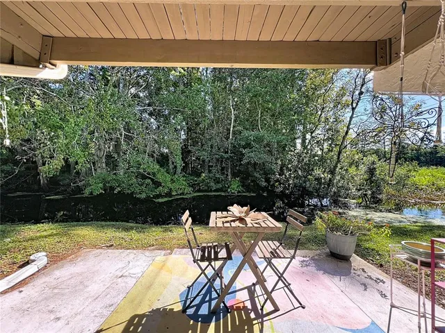 a view of swimming pool with a patio