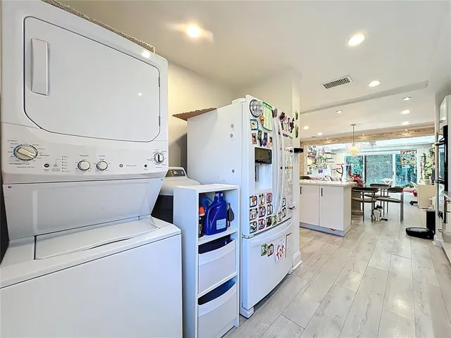 a utility room with washer and dryer