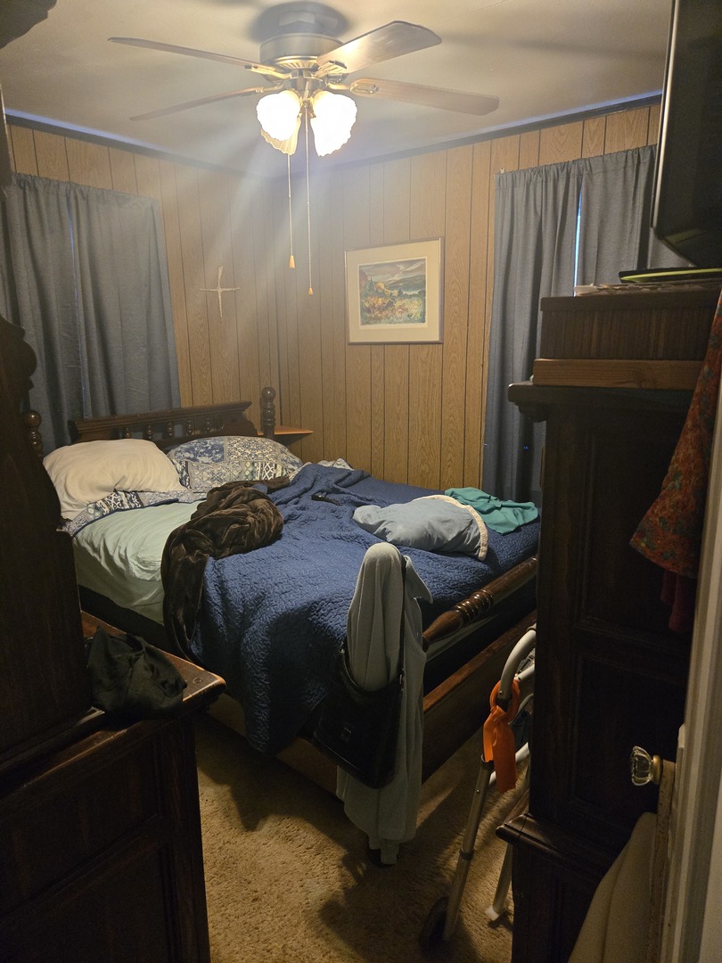 2038 Ruby Street Melrose Park, IL 60164 - Photo 11 of 13 a bedroom with a bed and a mirror