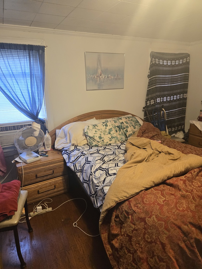 2038 Ruby Street Melrose Park, IL 60164 - Photo 12 of 13 a bedroom with a bed and a closet