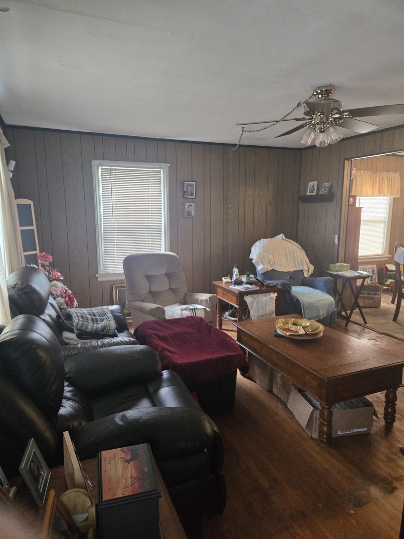 2038 Ruby Street Melrose Park, IL 60164 - Photo 5 of 13 a room with furniture and chandelier