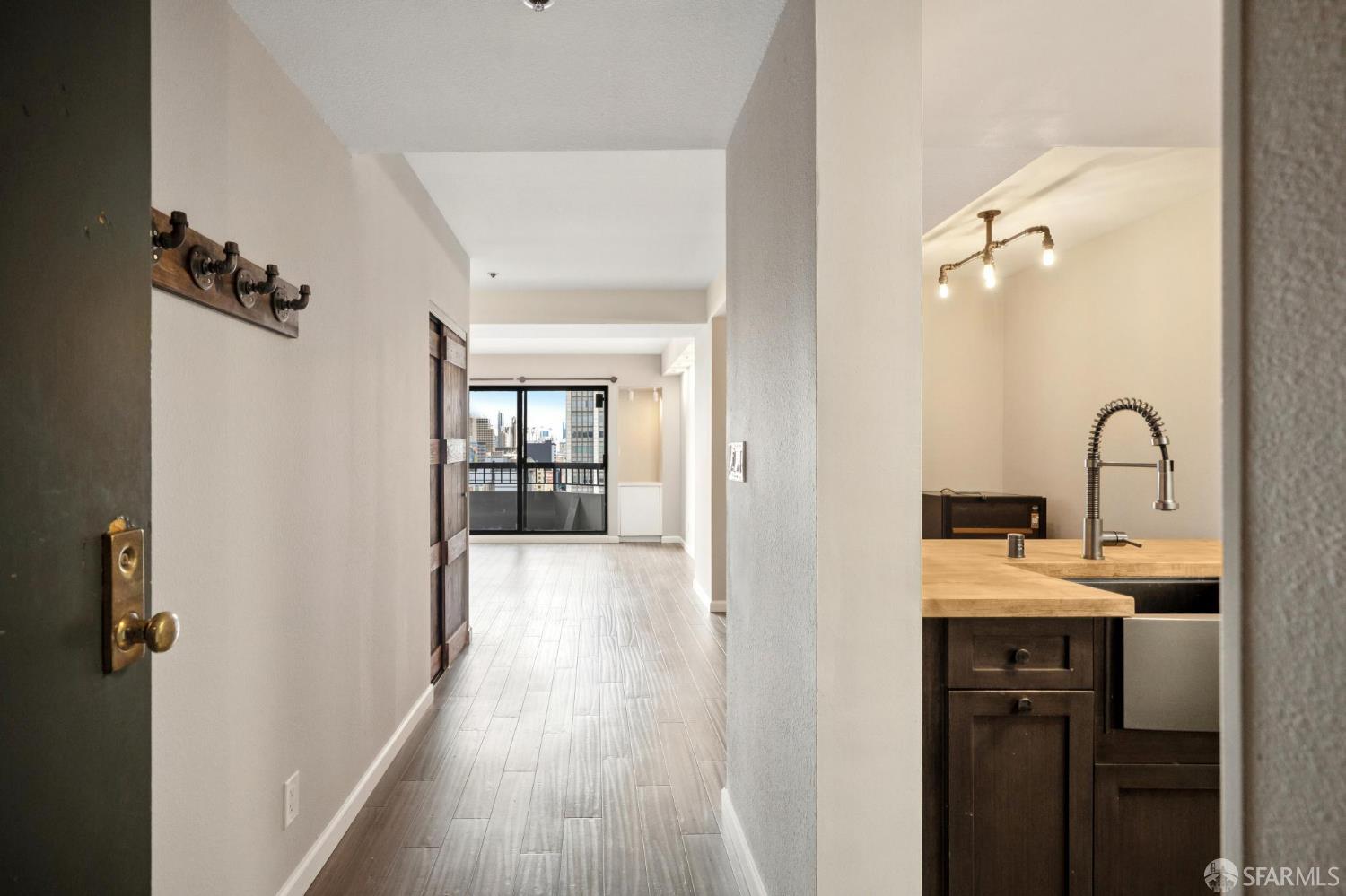 601 Van Ness Avenue, Unit 812 San Francisco, CA 94102 - Photo 2 of 33 a en suite bathroom with a sink and mirror