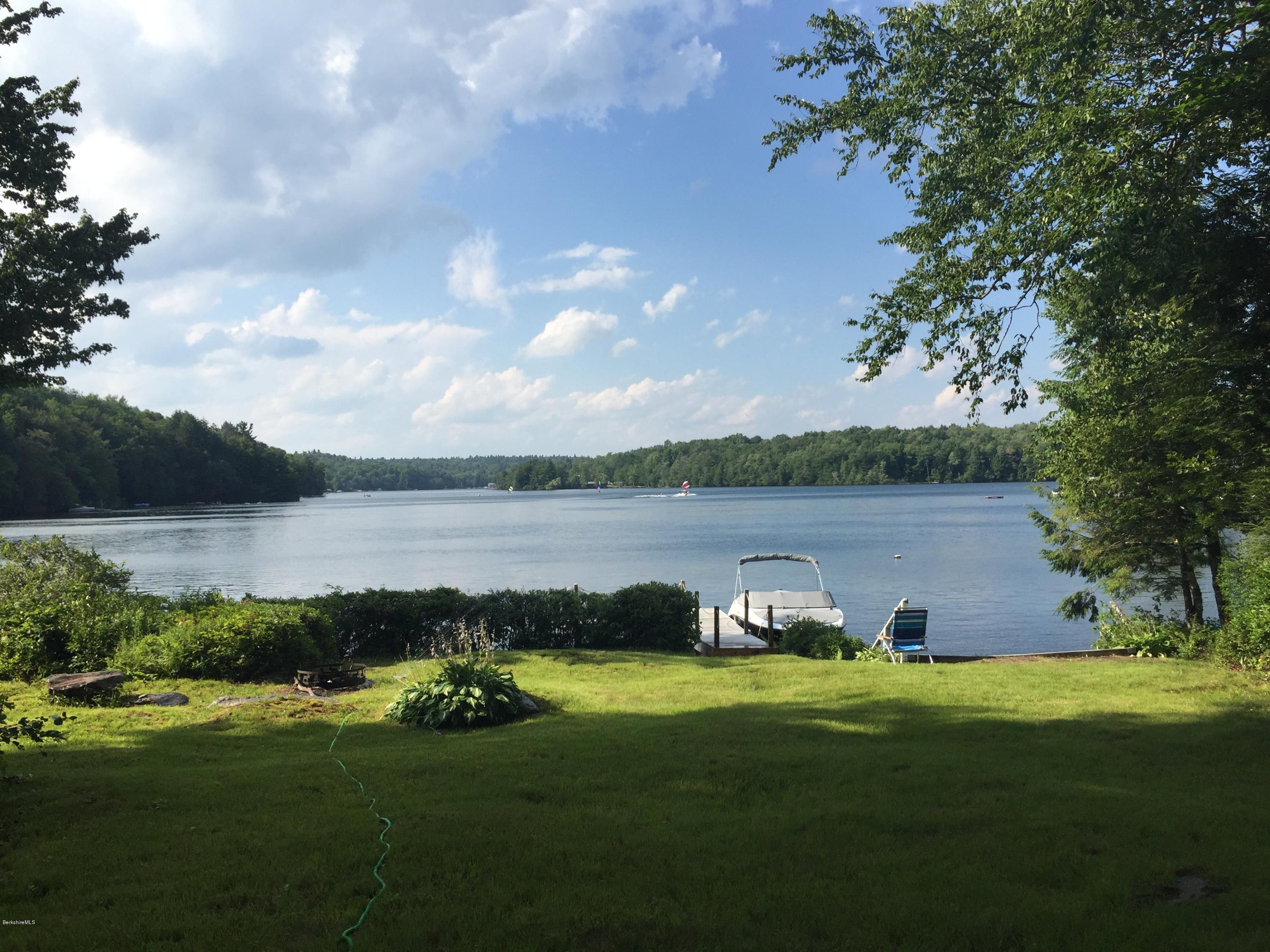 59 Williams Road Becket, MA 01223 - Photo 17 of 18 a lake view with a big yard and potted plants