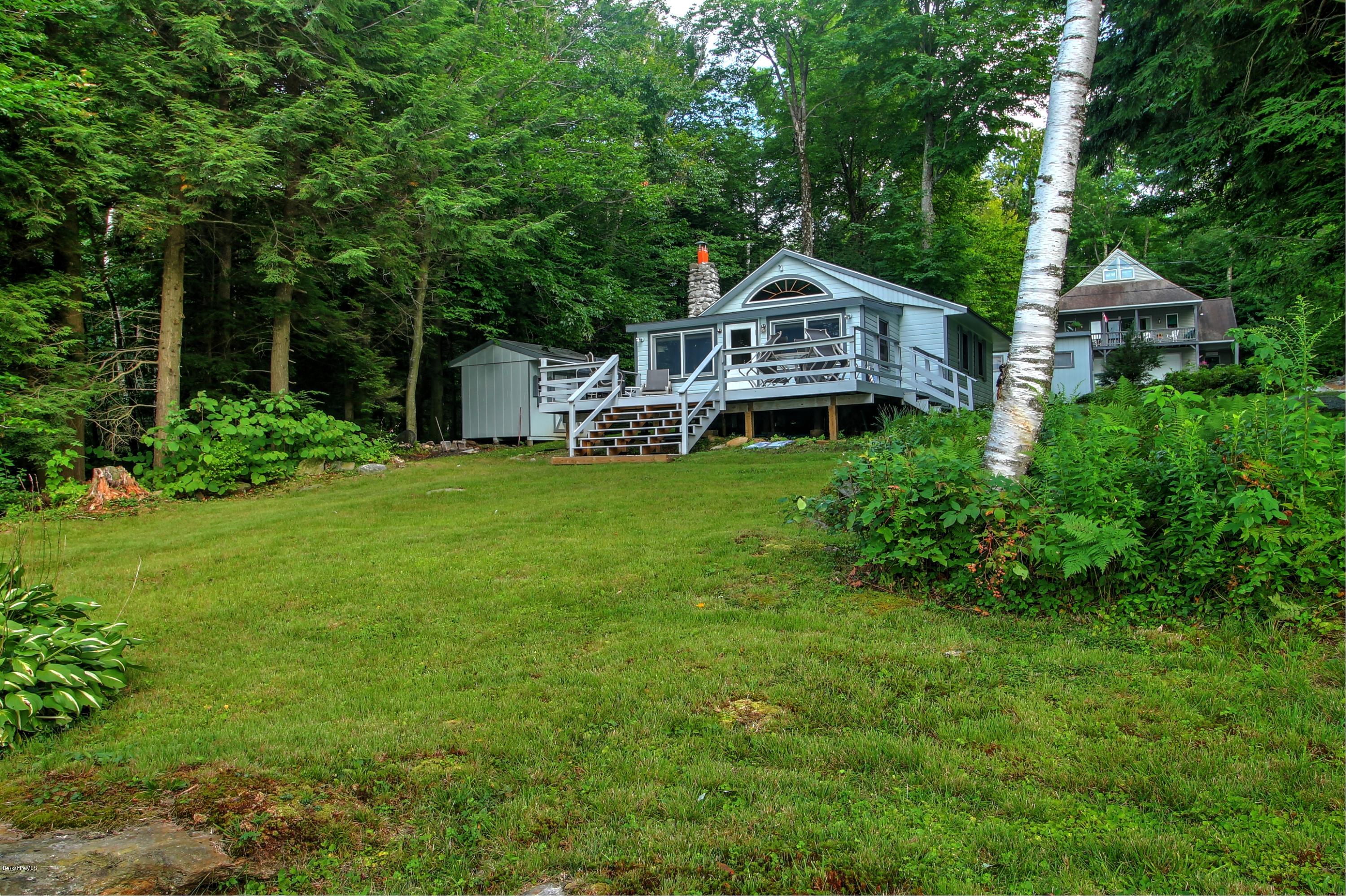 59 Williams Road Becket, MA 01223 - Photo 3 of 18 a front view of a house with garden