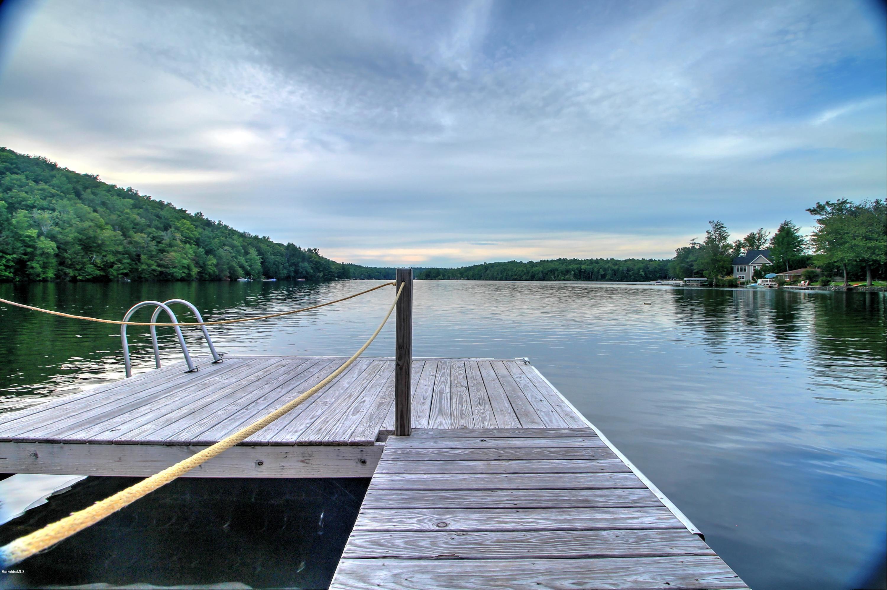 59 Williams Road Becket, MA 01223 - Photo 4 of 18 a deck with hardwood and lake view