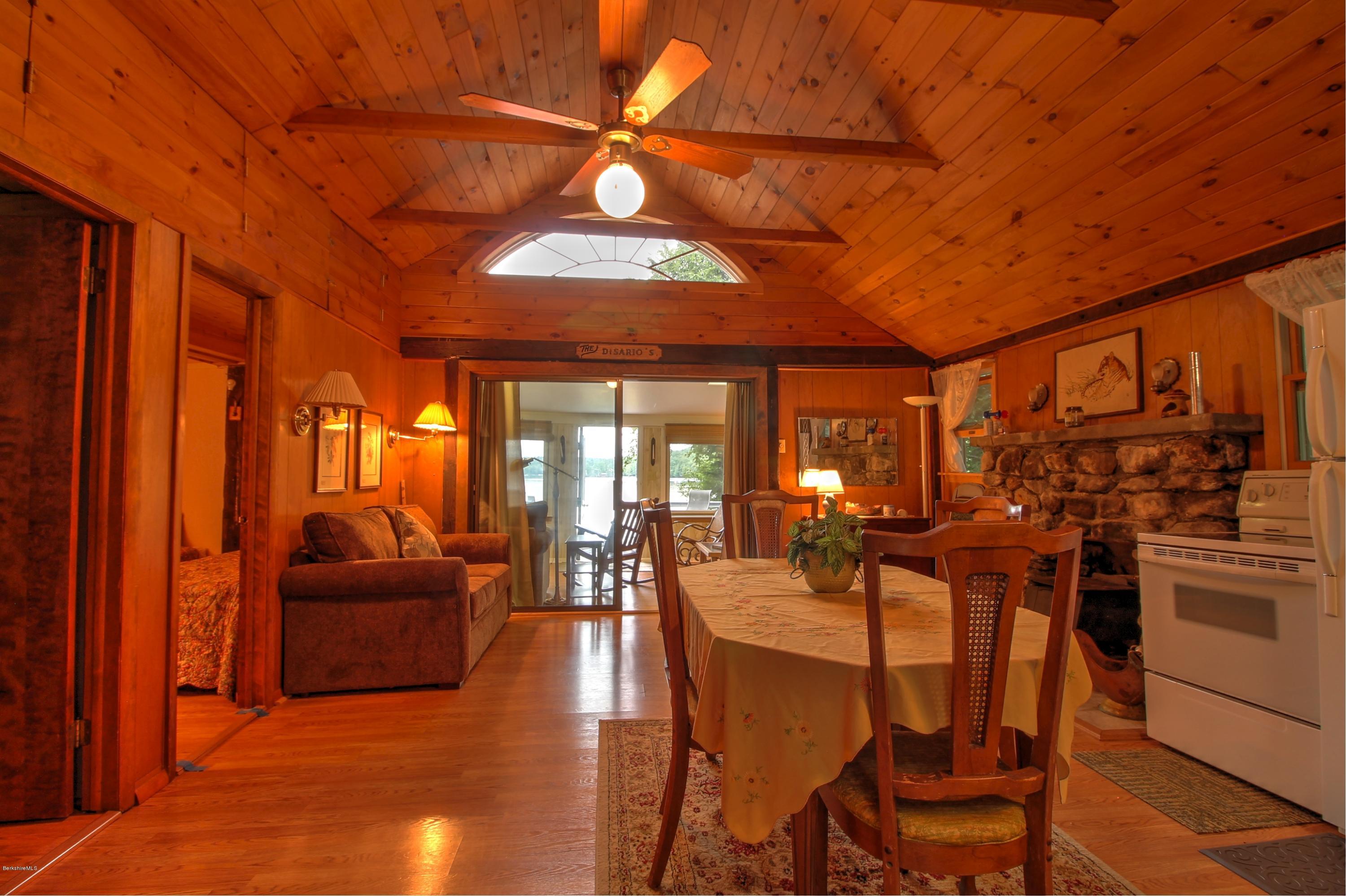 59 Williams Road Becket, MA 01223 - Photo 6 of 18 a view of a dining room with furniture window and outside view