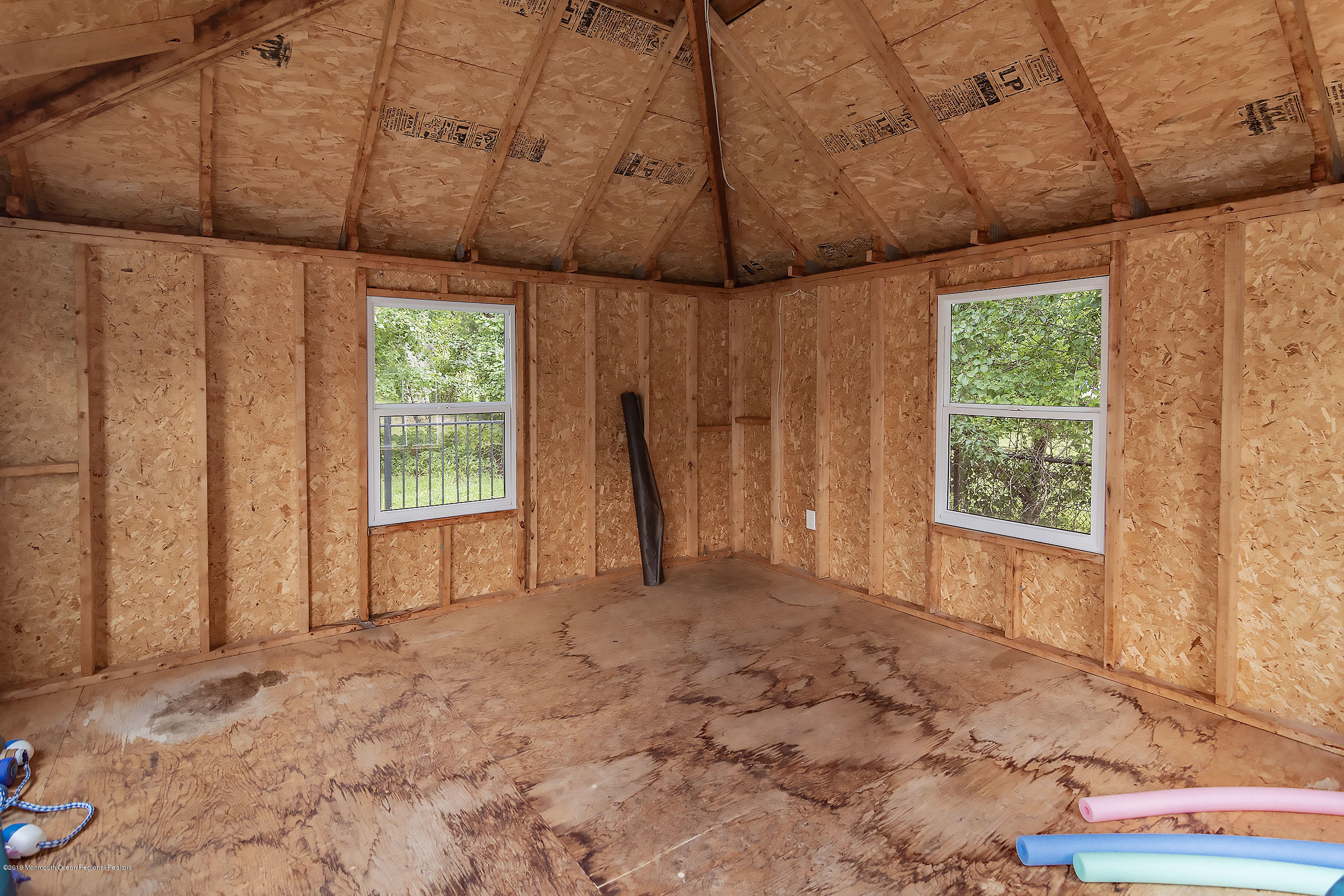 411 Meadowood Road Jackson, NJ 08527 - Photo 22 of 30 a view of a room with a bed and a window