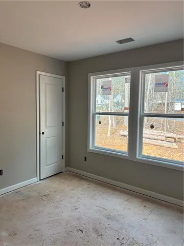 an empty room with a window