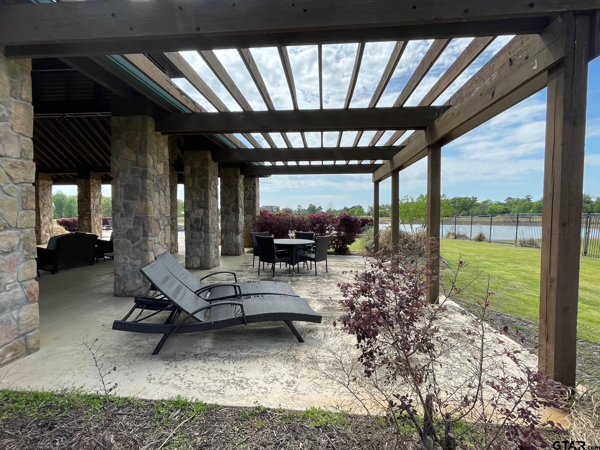 2712 Tbd Private Road Mount Pleasant, TX 75455 - Photo 14 of 18 a living room with large windows