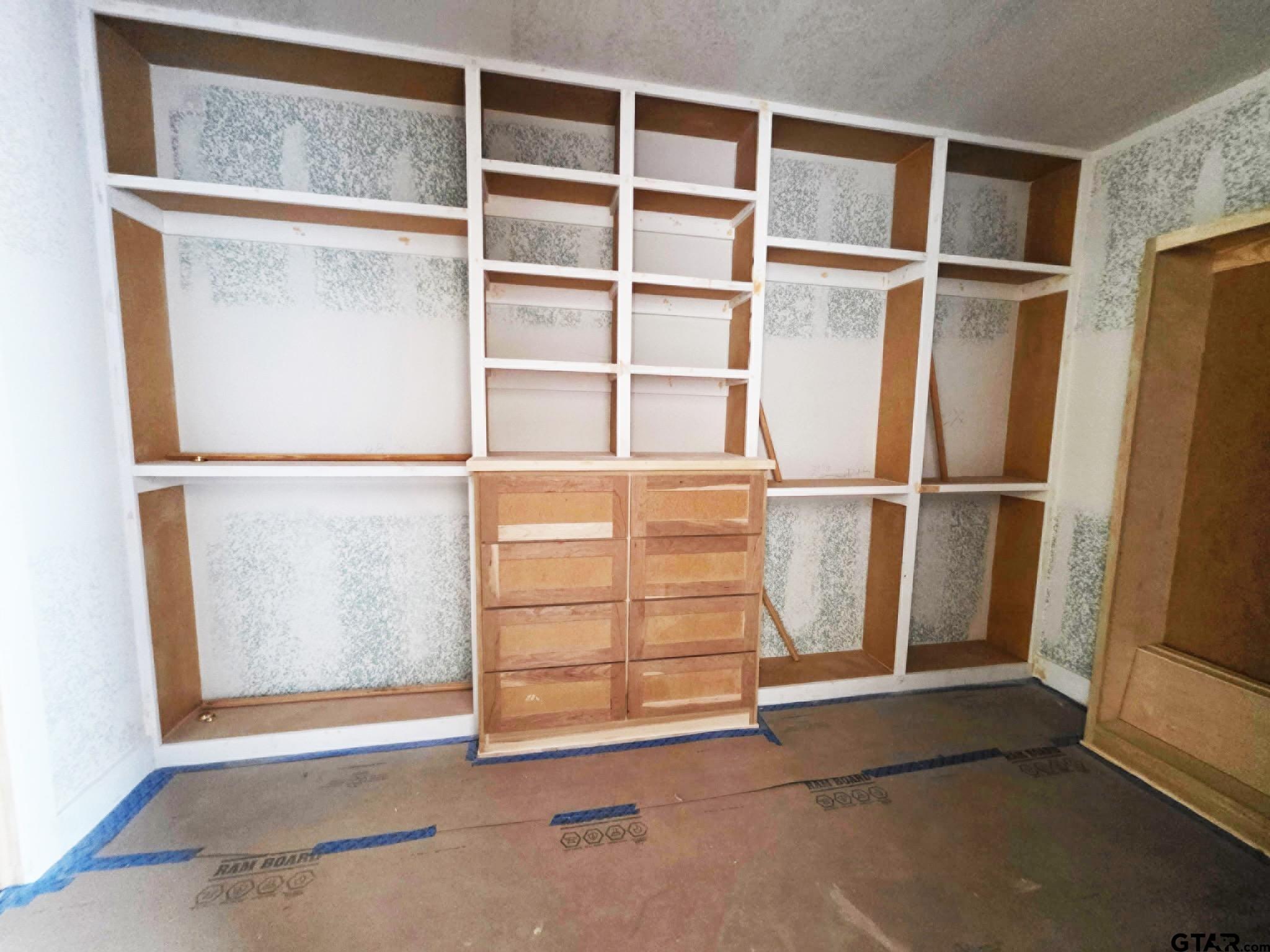 2712 Tbd Private Road Mount Pleasant, TX 75455 - Photo 4 of 18 a view of an empty room with wooden floor and a window