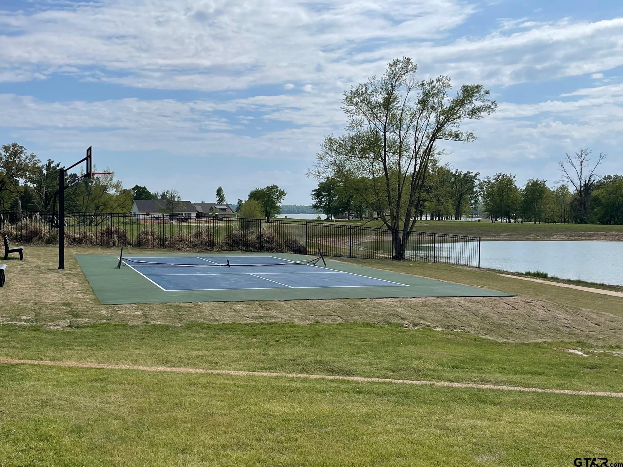 2712 Tbd Private Road Mount Pleasant, TX 75455 - Photo 8 of 18 a view of an outdoor space and tennis court