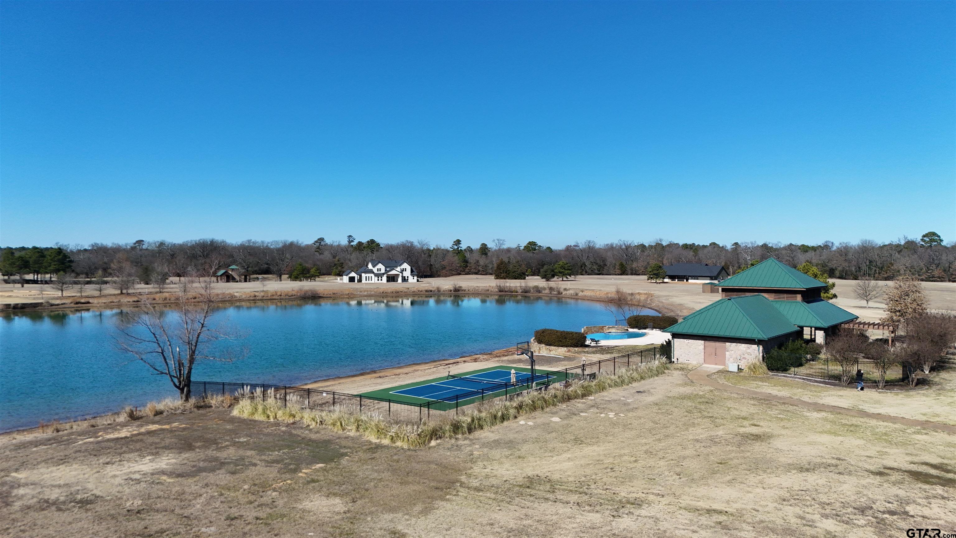 2712 Tbd Private Road Mount Pleasant, TX 75455 - Photo 9 of 18 a view of a lake with outdoor space