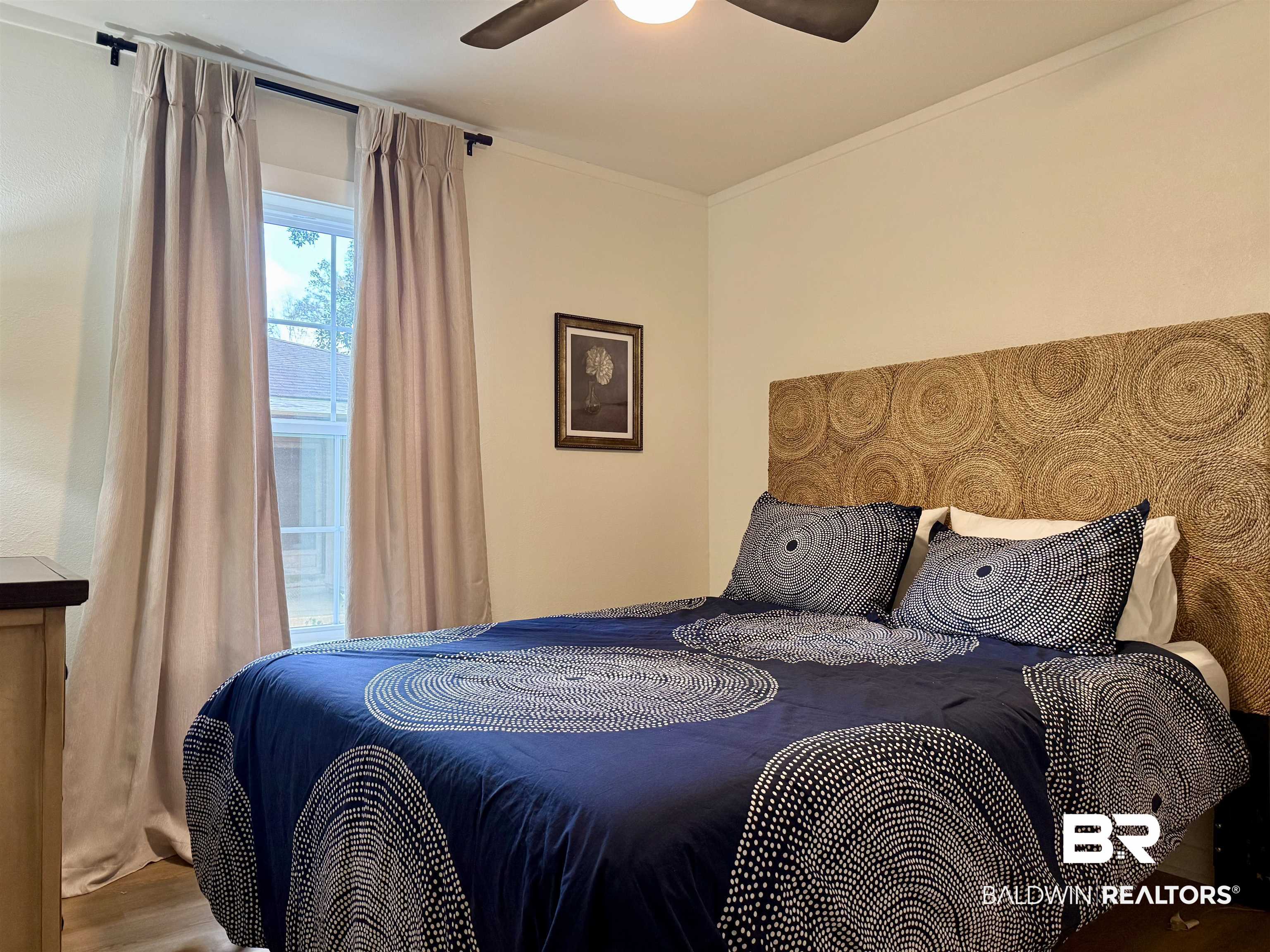107 Dawson Street Brewton, AL 36426 - Photo 14 of 15 Bedroom featuring a ceiling fan and wood finished floors