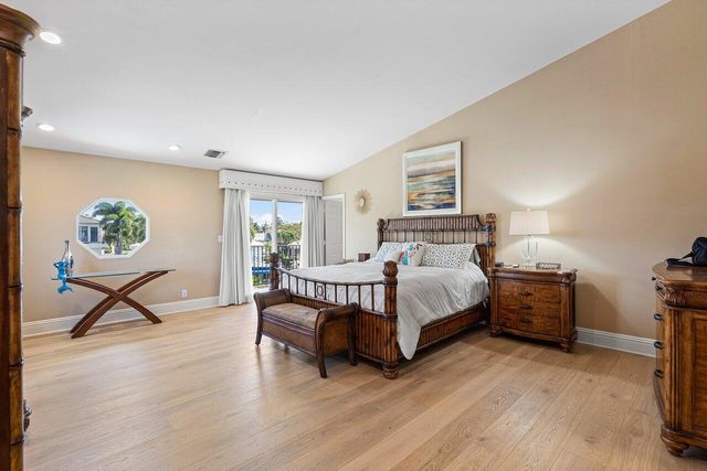 a outdoor space with patio couch and a potted plant