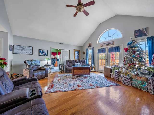 a bathroom with a sink mirror vanity and toilet