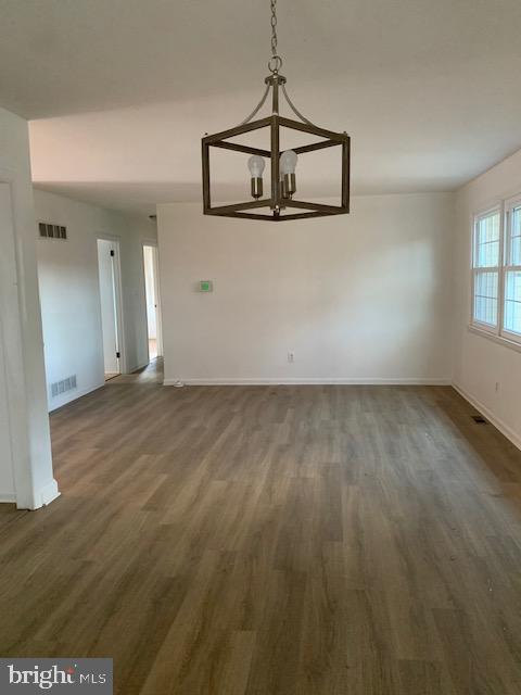 3121 Mt Zion Road Upperco, MD 21155 - Photo 11 of 43 an empty room with wooden floor and windows