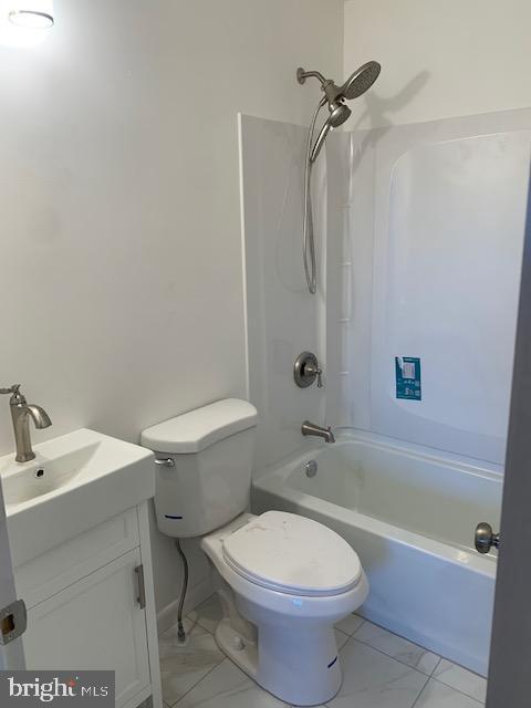 3121 Mt Zion Road Upperco, MD 21155 - Photo 14 of 43 a white toilet sitting next to a bath tub