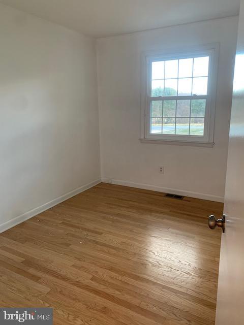 3121 Mt Zion Road Upperco, MD 21155 - Photo 15 of 43 a view of a room with wooden floor and a window
