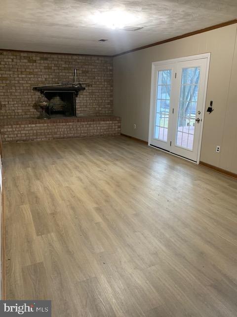 3121 Mt Zion Road Upperco, MD 21155 - Photo 32 of 43 an empty room with wooden floor and windows