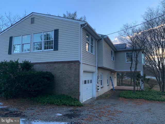 3121 Mt Zion Road Upperco, MD 21155 - Photo 39 of 43 a front view of a house with a yard